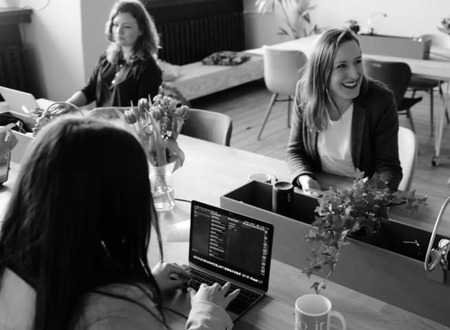 Women working in the office and smiling