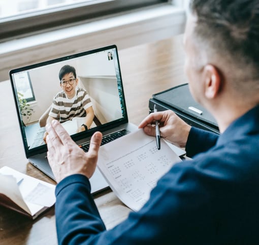 man having an online video meeting