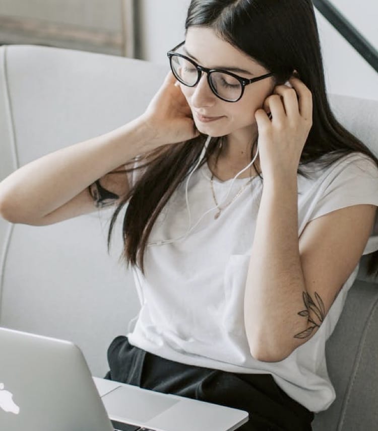 Background with young woman working with laptop